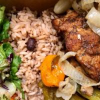 Jerk Salmon Dinner · Marinated Jerk Salmon served with choice of rice, veggies, and a piece of plantain. Comes wi...