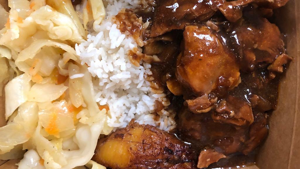 Stew Chicken Dinner · Brown Stewed Chicken served with choice of rice, veggies, and a piece of plantain.