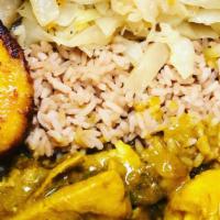 Curry Chicken Dinner · Curried Chicken served with choice of rice, veggies, and a piece of plantain.