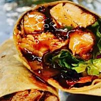 Jerk Shrimp Wrap · (4) Tender marinated jumbo shrimp on a wheat wrap with mixed garden salad, jerk bbq sauce & ...