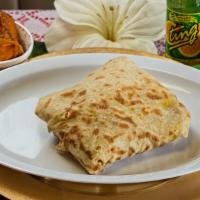 Curry Chicken Roti · Dahl Puri Roti filled with curry chicken