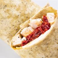 Chipotle Chicken Wrap · Grilled chicken wrap, fresh mozzarella, Italian sun dried peppers, and chipotle mayo on a sp...