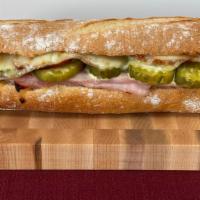 The Desi · Fratelli Roasted Pork Loin, Ham, Pickles, Swiss cheese on a Toasted Baguette  with Fratelli ...