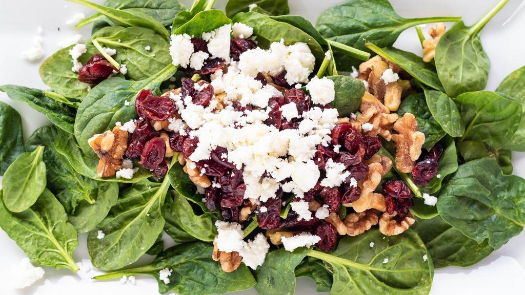 California Salad · Organic Baby spinach, walnuts, feta cheese, and dried cranberries.