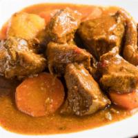 Res Guisada · Beef stew.