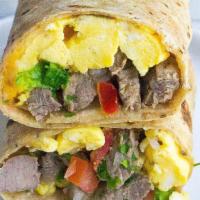 Philly Breakfast Wrap · Eggs, Philly steak, onions, peppers, and cheddar cheese.