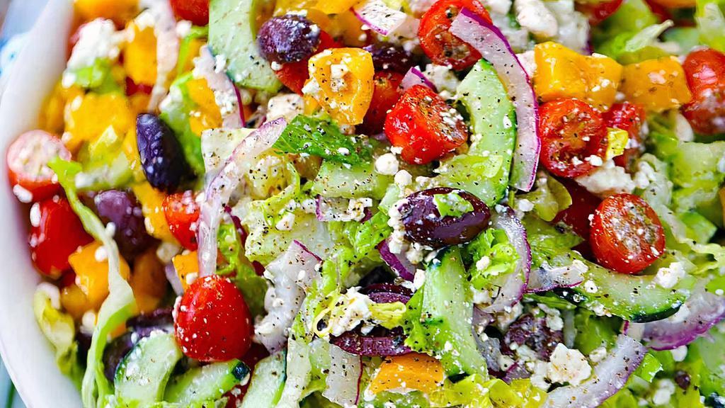 Greek Salad · Romaine lettuce, tomato, cucumbers, olive, onions, feta cheese, and olive oil.