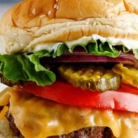 Cheeseburger · Beef patty, American cheese, lettuce, and tomato.