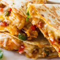 Shrimp Quesadilla · Shrimp, grilled onions, peppers, jack cheese, kale, spinach, and sour cream.