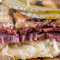 Ruben Special Sandwich · Corned beef, sauerkraut, swiss cheese, and 1000 island dressing.