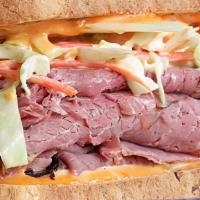 Brooklyn Love Special Sandwich · Hot pastrami, corned beef, swiss cheese, coleslaw, and Russian dressing.