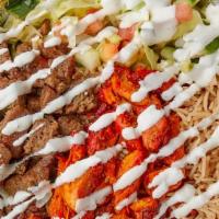 Combo Over Rice · Rice , halal lamb , halal chicken ,pita chopped lettuce, tomatoes ,cucumber, white and hot s...