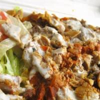 Chicken Over Rice · Rice , halal chicken , lettuce, tomatoes ,cucumber, white and hot sauce.