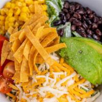 Tex Mex Salad · Chopped romaine hearts, corn, black beans, tomato, pepper jack & cheddar cheese, avocado & t...