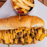 Whiskey Priest Cheesesteak · Thinly sliced grilled steak covered with sautéed onions, jalapenos, peppers, cheese & chipot...