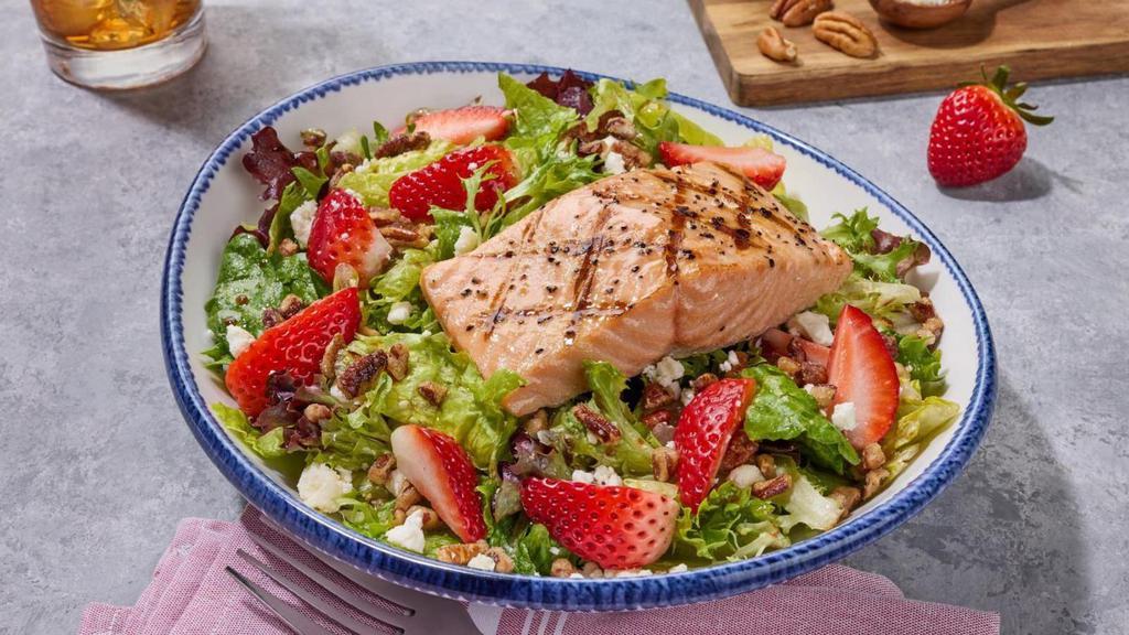 New! Strawberry-Pecan-Salmon** Salad · Grilled salmon, strawberries, feta, pecans, and a strawberry balsamic vinaigrette served over mixed greens.. 960 Cal