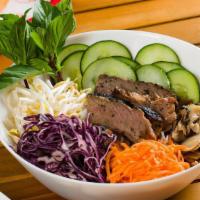 Smoked Brisket Vermicelli Bowl · Vermicelli noodles, pickled carrots, cucumbers, Thai basil, bean sprouts, red cabbage, and s...