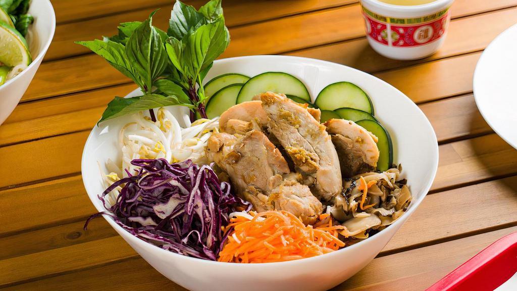 Lemongrass Chicken Vermicelli Bowl · Vermicelli noodles, pickled carrots, cucumbers, Thai basil, bean sprouts, red cabbage, and shiitake mushrooms. Served with house fish sauce on the side.