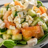 Arabic Salad · Tomato, cucumber, red onion, feta, with lemon juice and extra virgin olive oil.