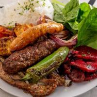 Mixed Bbq Platter · Grilled lamb cutlet, chicken kebab and lamb kofta kebab. Served with white basmati rice, gre...