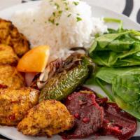 Chicken Shish Kebab Platter · Served with white basmati rice, beet salad, green salad, grilled tomato, onion and jalapeño.