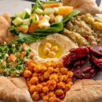 Vegan Platter · An assortment of vegan appetizers. Served with whole wheat pita bread.