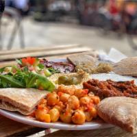 Vegan Platter · An assortment of vegan appetizers. Served with whole wheat pita bread.