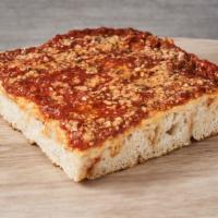 Upside Down Sicilian Pizza · Sicilian pie with mozzarella on the bottom layer, topped off with marinara sauce, pecorino R...