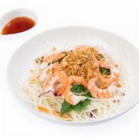 Papaya Salad With Grilled Shrimp · Spicy.  Gluten-free. purple cabbage, carrot, fried onion, mint leaf, and peanut.