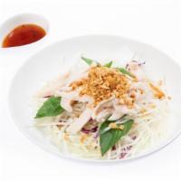 Papaya Salad With Grilled Chicken · Gluten-free. purple cabbage, carrot, fried onion, mint leaf, and peanut.