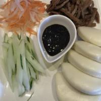 Vietnamese Steamed Buns · Steamed Buns, Cucumber, Pickled Radish with Hoisin Sauce.