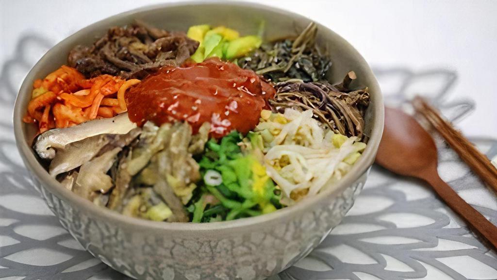 Bibimbap · Beef and a variety of mixed vegetables with rice.