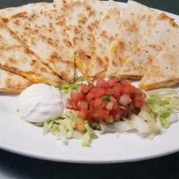*Quesadillas · flour tortillas, cheddar cheese, tomatoes, fire-roasted peppers . and onions, sour cream, pi...