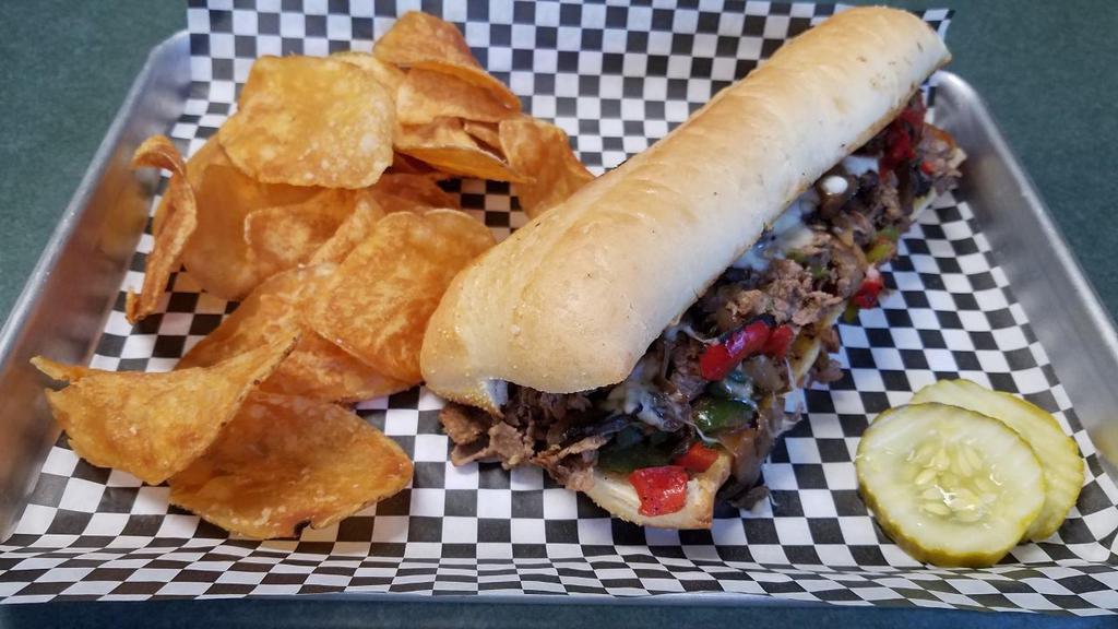 *Philly Cheesesteak · grilled thinly sliced usda choice grass-fed sirloin steak, peppers, onions, sautéed mushrooms, mozzarella, toasted sub roll /. sub chicken at no additional charge