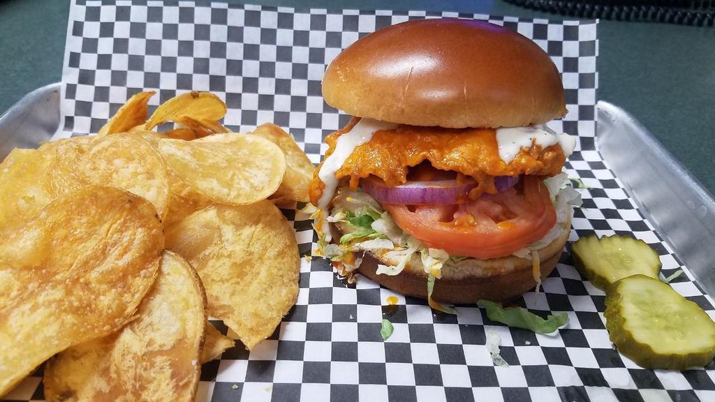 *Buffalo Chicken Sandwich · hand-breaded chicken breast cooked golden crisp, buffalo sauce, toasted brioche roll, lettuce, tomato, red onion & topped with bleu cheese dressing  . sub grilled chicken at no additional charge