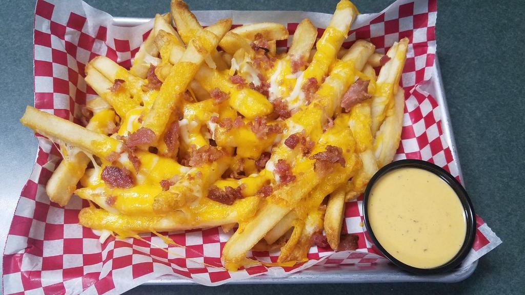*Side Loaded Fries · fries topped with cheddar cheese, bacon, served with spicy ranch