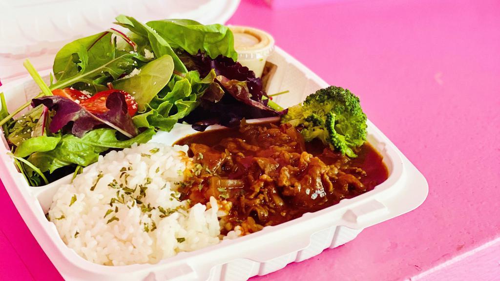 Hayashi Rice Bento · Hayashi Rice is a Japanese comfort food made with hashed beef, onion and mushrooms in a tomato red wine base. Served with white rice and salad.