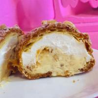 Double Cookie Cream Puff · Cookie crust puff with crunchy sugar, filling is custard cream and whip cream with cookie pi...