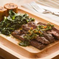 Carne Asada · Grilled eight oz flank steak topped with chimichurri sauce, served with sweet plantains and ...