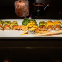 Magic Roll · shrimp tempura  and spicy tuna inside ,topped  with mango and avocado  ,chef  special sauce