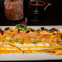 Black Angle Roll · shrimp tempura  avocado mango wrapped with soybean paper topped with  spicy   crab  masago  ...