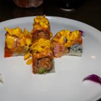 Yummy Yummy  Roll · spicy crab  avocado inside ,topped  with  seared salmon ,chopped  mango  spicy  mayo  wasabi...