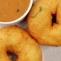 Medhu Vada (2 Nos) · Crispy lentil doughnut served with sambar and chutney.