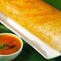 Masala Dosa · Thin rice and lentil crepe filled with spiced mashed potatoes and onions. Served with three ...