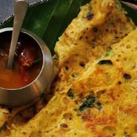 Ghee Onion Rava Masala Dosa · Thin crispy crepe from semolina and rice sprinkled with ghee, mildly spiced and garnished st...