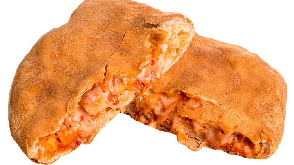 Chicken Parmazone · Calzone filled with breaded chicken, mozzarella cheese, parmesan cheese and marinara sauce.  Served with a side of Marinara