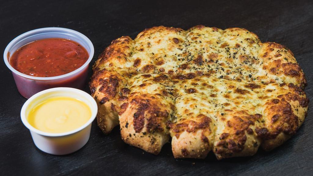 Cheese Stix · Mozzarella Cheese, Italian spices, and Parmesan melted on bite sized D.P. Dough stix.