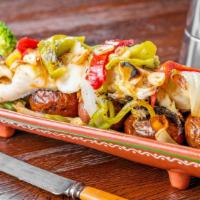 Grilled Codfish (Lagareiro Style) · Norwegian cod served with roasted potatoes, peppers, onions and steamed vegetables / bacalha...