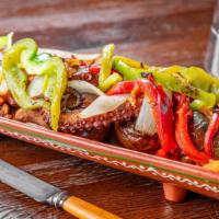 Grilled Octopus (Lagareiro Style) · Spanish octopus served with roasted potatoes, peppers, onions and steamed vegetables / polvo...