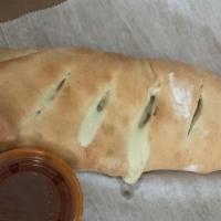 Veggie Stromboli · Peppers, onions, broccoli, and spinach.